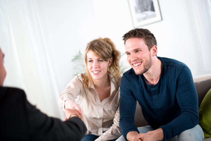 couple buying a new heat pump