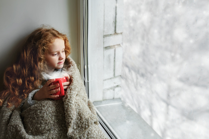 girl with cup of cocoa