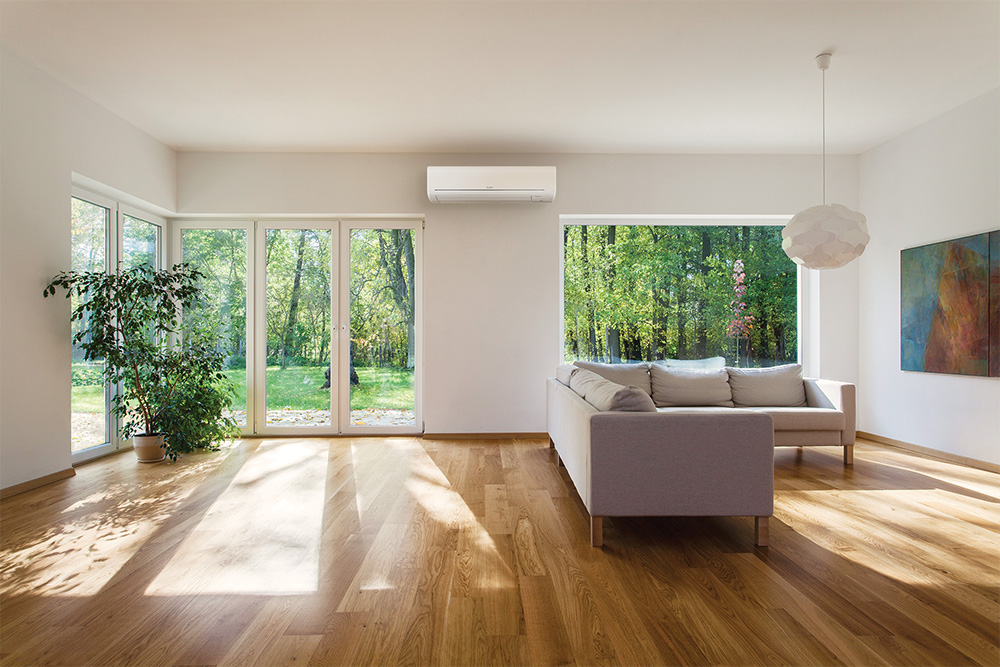 MITSUBISHI HEAT PUMPS SOLD AND INSTALLED BY HEAT AND COOL - HEAT PUMP IN A bright and airy living room